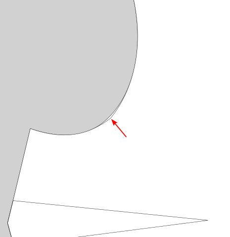 Ein roter Pfeil zeigt auf die kleine Ecke, die in der Armlochkurve entstanden ist